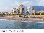 A sunny day overlooking a coastal resort town. Mahmutlar, Turkey (2024 год). Редакционное фото, фотограф EugeneSergeev / Фотобанк Лори