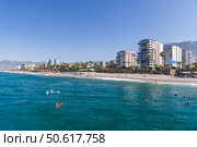 Scenic view of a coastal resort town with modern buildings (2024 год). Редакционное фото, фотограф EugeneSergeev / Фотобанк Лори