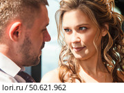 Captivating Gaze Exchanged Between Two Lovers in a Bright, Modern Setting. Стоковое фото, фотограф Aleksandr Golubev / Фотобанк Лори