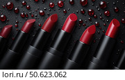Top view row of passion red lipsticks displayed against black background. Beauty industry and fashion concept. Copy space. Advertisement for makeup artists. Стоковое AI-изображение, AI-художник Ирина Михайличенко / Фотобанк Лори