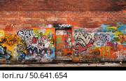streeturban ghetto brick wall ai generated. Стоковое AI-изображение, AI-художник Vectorwin / Фотобанк Лори