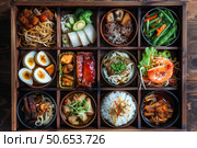 Traditional japanese food bento box assortment on a table. Стоковое AI-изображение, AI-художник Иван Рябоконь / Фотобанк Лори