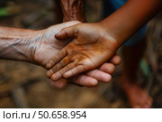 Hands joining together showing multi generational unity and support. Стоковое AI-изображение, AI-художник Иван Рябоконь / Фотобанк Лори