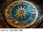 Antique nautical compass rose on wooden surface. Стоковое AI-изображение, AI-художник Иван Рябоконь / Фотобанк Лори