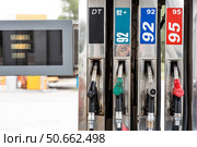 Gas station. Refueling the car with gasoline. A Russian fuel dispenser at a gas station. Rising fuel prices around the world. Стоковое фото, фотограф Photojuli / Фотобанк Лори