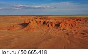 Bayanzag flaming cliffs at sunset in Mongolia. Стоковое фото, фотограф Михаил Коханчиков / Фотобанк Лори