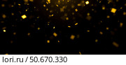 Bright gold particles floating in black space blurry circles illuminated glowing festive shimmer glittering. celebration abstract background rich warm golden tones. Стоковое фото, фотограф Павел Муравьев / Фотобанк Лори