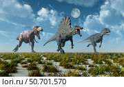 A Tyrannosaurus rex, Spinosaurus and Allosaurus dinosaur. Стоковое фото, фотограф Mark Stevenson/Stocktrek Images / ТАСС / Фотобанк Лори