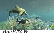 An adult and a young juvenile Stenopterygius ichthyosaur hunting for food. Стоковое фото, фотограф Arthur Dorety/Stocktrek Images / ТАСС / Фотобанк Лори