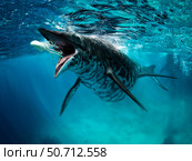 A Shastasaurus prepares to swallow a cephalopod. Стоковое фото, фотограф José Antonio Peñas/Stocktrek Images / ТАСС / Фотобанк Лори