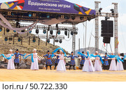 ELANTSY VILLAGE, IRKUTSK REGION, RUSSIA - July 5, 2025: Erdynskie Games - festival of nomadic peoples of Eurasia. Artists sings Buryat folk songs and dances dance with blue hadaks on open stage. Редакционное фото, фотограф Виктория Катьянова / Фотобанк Лори
