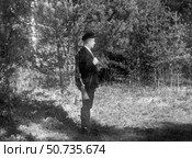 Охотник с ружьём в лесу на поляне. Стоковое фото, фотограф Retro / Фотобанк Лори