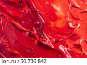 Mixing red and orange paint creates abstract swirls and bubbles. Стоковое AI-изображение, AI-художник Иван Рябоконь / Фотобанк Лори