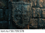 Medieval shield hanging on a wooden post in a stone castle. Стоковое AI-изображение, AI-художник Иван Рябоконь / Фотобанк Лори