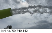 Foam cannon on the background of the sky with clouds. White foam flies out onto the playground to celebrate. Стоковое видео, видеограф Darya Komarova / Фотобанк Лори