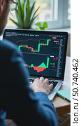 Businessman using laptop for analyzing data stock market. Forex trading graph concept. Trading forex data information. Стоковое AI-видео, аниматор Sergey Grishin / Фотобанк Лори