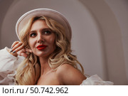 Lady In White Hat Looks Off, Elegant And Stylish Portrait. Стоковое фото, фотограф Aleksandr Golubev / Фотобанк Лори