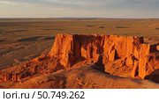 Bayanzag flaming cliffs at sunset in Mongolia. Стоковое фото, фотограф Михаил Коханчиков / Фотобанк Лори