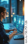 Businesswoman working on laptop with virtual screen. Process automation to efficiently manage files. Online documentation database and document management system concept. Стоковое AI-видео, аниматор Sergey Grishin / Фотобанк Лори