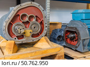 Cross section of industrial gearbox showing internal components in warehouse. Стоковое фото, фотограф Юрий Поздников / Фотобанк Лори