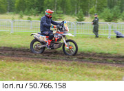 ANGARSK, IRKUTSK REGION, RUSSIA — July 13, 2025: XV International Silk Way Rally, motorcycle racing competition. Race on a high-speed special stage in Angarsk. Rider №73 Alexey Shvetsov on dirt track. Редакционное фото, фотограф Виктория Катьянова / Фотобанк Лори