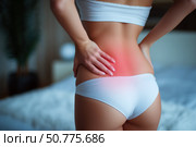 Back pain, kidney inflammation, woman suffering from backache at home. Стоковое AI-изображение, AI-художник Станислав Тарко / Фотобанк Лори