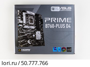 Maykop, Russia - February 18, 2025: box with a new Asus prime B - 760 plus D4 motherboard on a light gray background top view. Редакционное фото, фотограф Андрей С / Фотобанк Лори