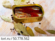 Open tin can of spicy sardines in aluminium can. Стоковое фото, фотограф Яков Филимонов / Фотобанк Лори