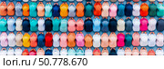 Colorful Congregation in Prayer: A High-Angle View of Diverse Individuals Bowing in Collective Worship. Стоковое AI-изображение, AI-художник Данила Большаков / Фотобанк Лори