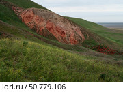 Picturesque slopes of the highest point of the Caspian lowland - Bolshoe Bogdo Mountains on a summer day, Bogdinsk-Baskunchak Nature Reserve, Akhtuba district, Astrakhan region, Russia. Стоковое фото, фотограф Ula Ulachka / Фотобанк Лори