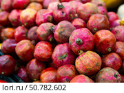 Close up of pomegranates in supermarket. Стоковое фото, фотограф Яков Филимонов / Фотобанк Лори