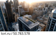 Solar panels on a modern rooftop city skyline. alternative energy source, energy saving, careful attitude to our planet Earth. Ecological energy renewable solar panel plant urban modern building landscape landmarks. Стоковое AI-изображение, AI-художник ALLA YURTAYEVA / Фотобанк Лори