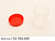 Jars for urine and fecal tests. Containers for medical tests. Стоковое фото, фотограф Valeriy Lushchikov / Фотобанк Лори