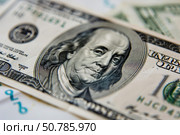 One hundred dollar bill showing benjamin franklin portrait close up. Стоковое AI-изображение, AI-художник Иван Рябоконь / Фотобанк Лори