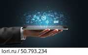 Man holding a tablet with a network of digital icons and data. Concept of global communication, business connectivity, and futuristic technology. Стоковое AI-изображение, AI-художник Анжелика Самсонова / Фотобанк Лори