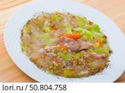 Scotch broth with barley, lamb, vegetables and peas. Стоковое фото, фотограф Яков Филимонов / Фотобанк Лори