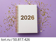 Empty notebook 2026. Purple color background. Blank Greeting Card, Invitation. Minimal Flier Design. Back to life, goal list concept. Resolutions, plan, goals, checklist idea. Top view. New Year. Стоковое AI-изображение, AI-художник Марина Демидюк / Фотобанк Лори