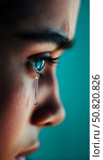 Concept: Expression of Sorrow: Portrait of a Crying Person with a Single Tear Rolling Down. Стоковое AI-изображение, AI-художник Данила Большаков / Фотобанк Лори