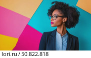 Confident Woman in Blazer Against Colorful Geometric. Стоковое AI-видео, аниматор Данила Большаков / Фотобанк Лори