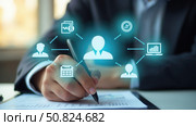 Payroll Management and Financial Processing System. Businessman works on payroll management with icons for payment, employee salaries, scheduling, analysis finance, and efficient planning. Стоковое AI-изображение, AI-художник Sergey Grishin / Фотобанк Лори