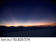 Sunset landscape depicting crepuscular rays. Стоковое фото, фотограф Roth Ritter/Stocktrek Images / ТАСС / Фотобанк Лори