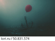 Submerged anchor with a single floating balloon in murky water creates a surreal underwater atmosphere. Стоковое AI-изображение, AI-художник Сергей Толмачёв / Фотобанк Лори
