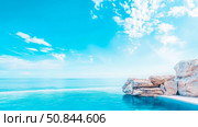 Serene seascape and infinity pool escape. Стоковое AI-изображение, AI-художник Данила Большаков / Фотобанк Лори