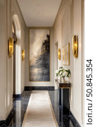 Elegant luxury hallway interior with marble floor, gold lighting, artwork. Стоковое AI-изображение, AI-художник Катерина Бондарец / Фотобанк Лори