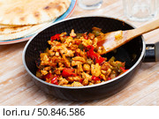 Chicken fajitas with peppers and onion in fry pan with tortillas. Стоковое фото, фотограф Яков Филимонов / Фотобанк Лори