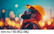 Concept: Worker Looking Up At Lights In Night. Стоковое фото, фотограф Данила Большаков / Фотобанк Лори