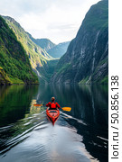 Explore Serene Waters While Kayaking Through Majestic Fjords on a Calm Day. Стоковое AI-изображение, AI-художник Юлия Гапеенко / Фотобанк Лори