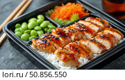 Delicious Grilled Chicken With Teriyaki Sauce Served With Rice and Vegetables in a Bento Box. Стоковое AI-изображение, AI-художник Юлия Гапеенко / Фотобанк Лори