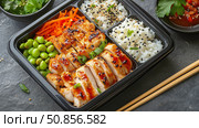 Delicious Bento Box Featuring Grilled Chicken, Rice, Veggies, and Sauce Enjoyed During Lunch Hour. Стоковое AI-изображение, AI-художник Юлия Гапеенко / Фотобанк Лори