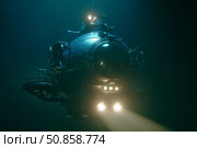 A deep-sea bathyscaphe plunges into the black water column of an endless ocean. Стоковое AI-изображение, AI-художник Алексей Кузнецов / Фотобанк Лори